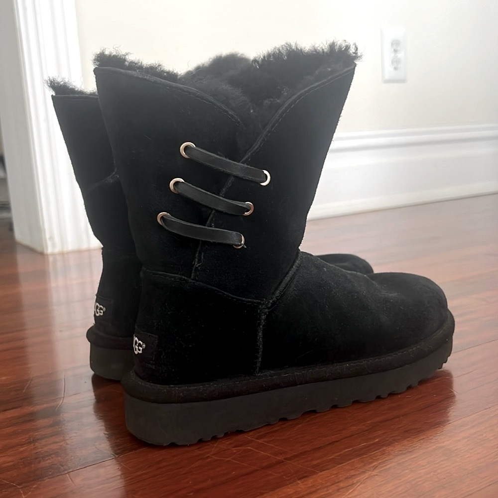 Ugg Boots. Size Size 6 Women’s or size 4 big kid. Black suede.